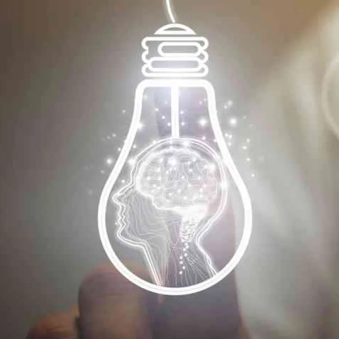 "upside down light bulb with outline of head and brain inside"